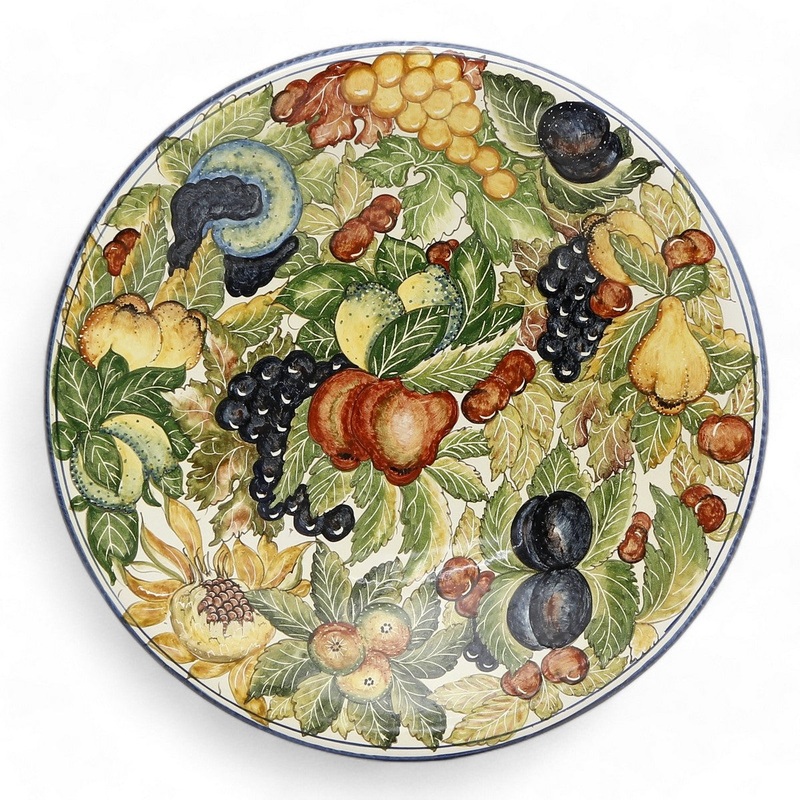 TUSCAN MAJOLICA: Large wall plate featuring assorted fruits and foliage. (22.5″ DIAM)